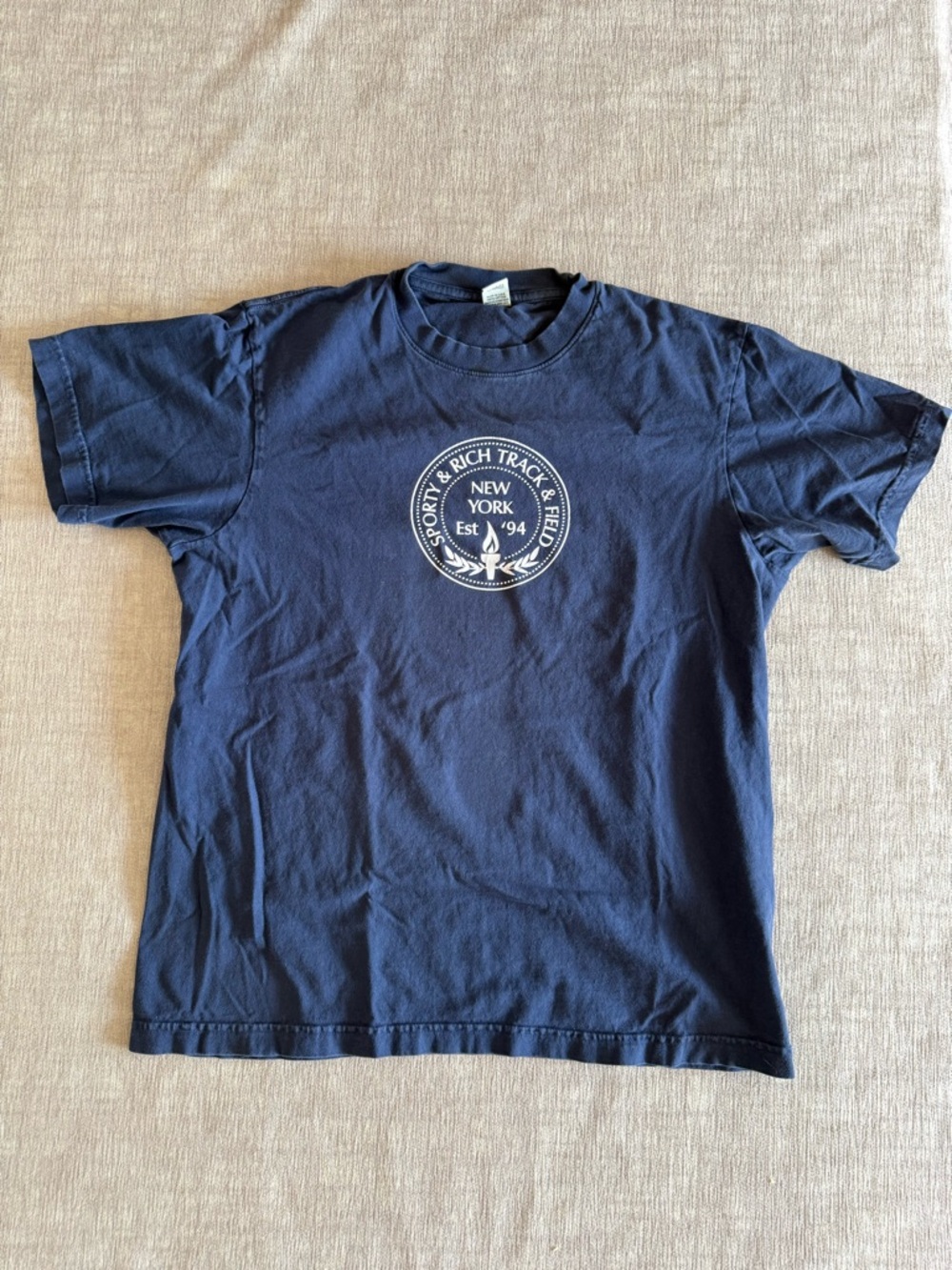 Sporty & Rich Navy Crewneck with White Circular Logo